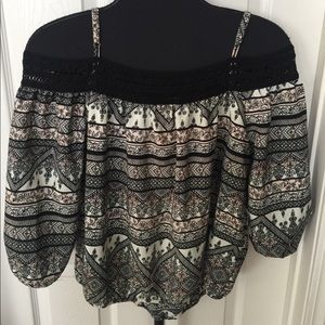 Cute bubble hem off the shoulder blouse